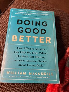 Doing Good Better by William MacAskill - Turquoise Paperback non-fiction book